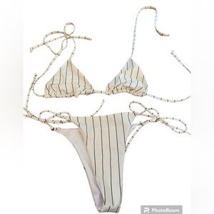 Demi’s string bikini, medium top and large bottoms white with navy strings